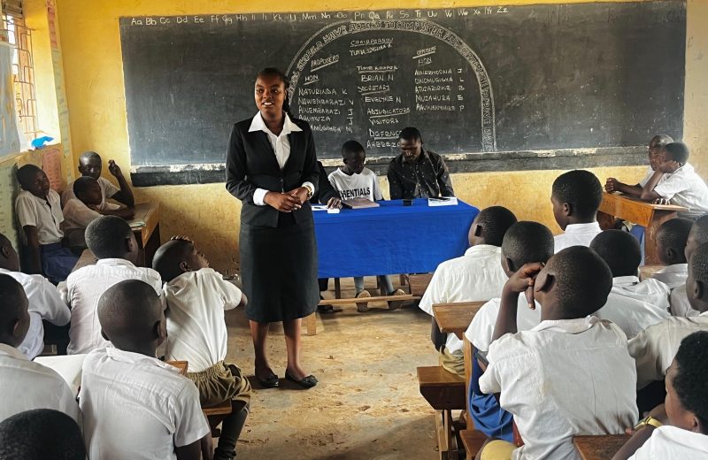 A PPG mentor leading a class-study session with pupils in the School Mentorship Programme