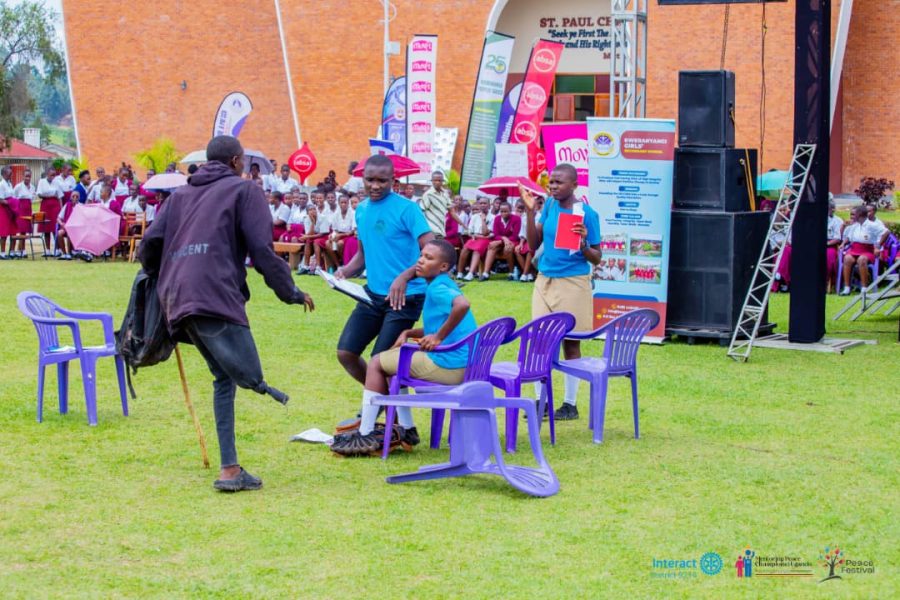 Students performing an outdoor drama piece at the Annual Peace Festival